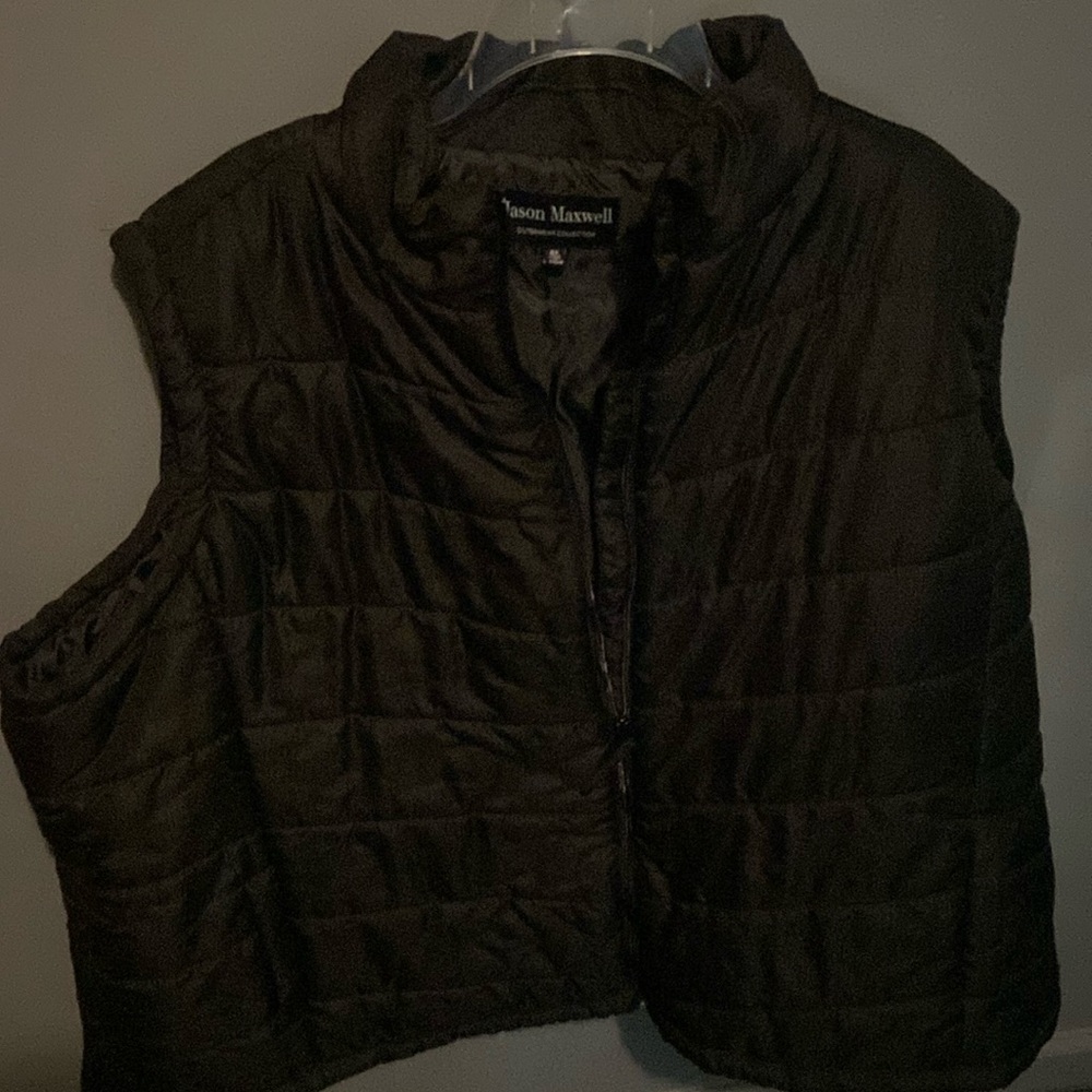 Jason Maxwell, black vest from the outerwear collection